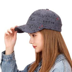 Grey graffiti baseball cap with black letter prints and wide brim in street style