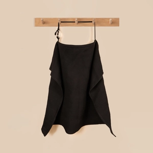 Detail of black waffle cotton nursing cover featuring adjustable neck strap and buckle