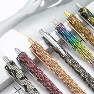 Sparkling crystal-studded retractable ballpoint pens in various metallic colors