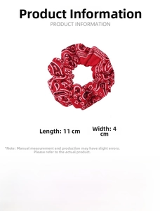 Details zum Paisley-Haargummi aus Polyester mit Maßen von 11 cm Länge und 10 g Gewicht
