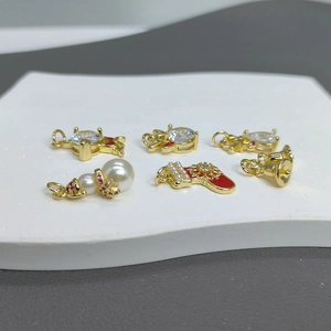 Christmas pendant set featuring reindeer and snowman with red enamel and white pearls