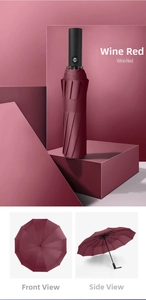 Detail of wine red automatic folding umbrella with matte handle and 12-rib structure