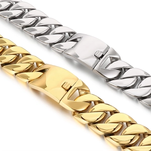 Detailed view of 31mm wide gold and silver Cuban link chains with square clasp fasteners