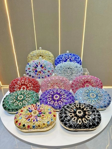 Luxury oval evening clutch with sunflower rhinestone pattern in multiple vibrant colors