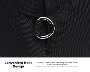 Detailed macro view of the durable black nylon fabric and a silver metal D-ring attachment