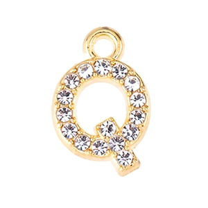 Detail of gold letter Q charm with sparkling rhinestones for jewelry making