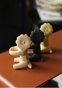 Three creative ceramic lion statues in matte finish used as desktop organizers and holders