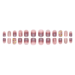Pink and purple gradient press-on nails with glitter, pearls and star ornaments
