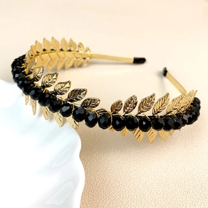Handmade golden leaf headband with faceted black crystal beads for a stylish hair accessory