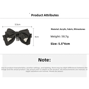 Detail view of black bow hair claw with rhinestones and fabric texture, size 5.5cm by 4cm