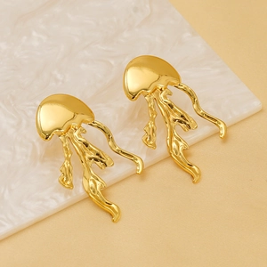 Elegant gold jellyfish titanium steel earrings on a minimalist marble background