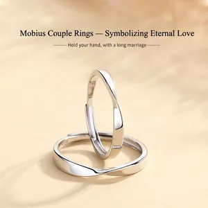 Minimalist S925 sterling silver Mobius rings for couples featuring a sleek twisted design