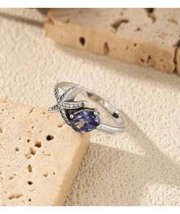 Detailed view of S925 sterling silver starfish ring with purple gemstone and crystals
