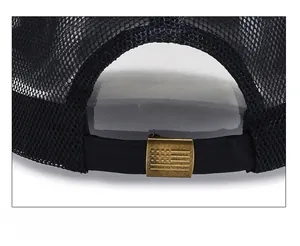 Detail of mesh baseball cap with adjustable strap and vintage US flag metal buckle