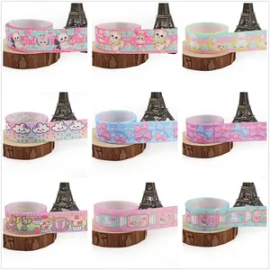 Detailed view of 1-inch cartoon grosgrain ribbons with cute cat and cloud patterns