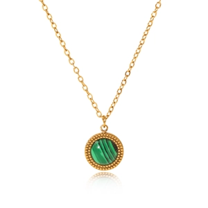 Macro shot of gold stainless steel necklace with circular green malachite gemstone pendant
