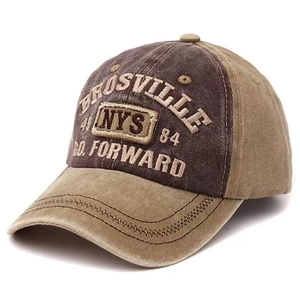 Detail of vintage washed cotton baseball cap with embroidered BRUSVILLE NYS 84 patches