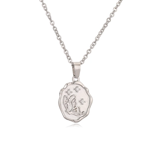 Minimalist silver butterfly pendant necklace with crystal accents on a white background