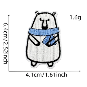 Detail of embroidered polar bear patch showing precise dimensions and light weight