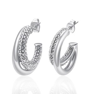 Silver C-shaped double hoop earrings with sparkling crystal pavé on white background