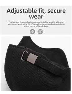 Detailed view of adjustable metal buckle on black winter wool flat cap for men