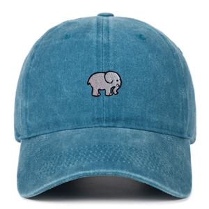 Close-up of elephant embroidery on a teal washed cotton baseball cap with a curved brim