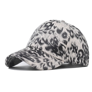 Classic cotton baseball cap with bold black and white leopard print for sun protection