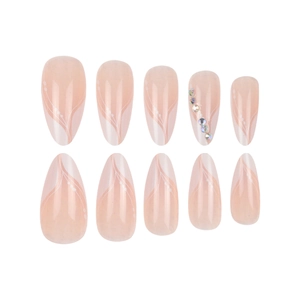 Faux ongles amande rose nude avec motifs vagues blanches et petits strass brillants