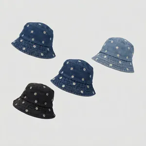 Three colors of denim bucket hats with daisy embroidery for sun protection and style