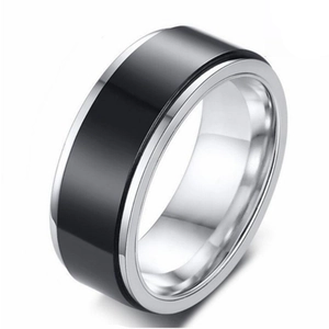 Minimalist black and silver stainless steel spinner ring with a polished rotatable finish