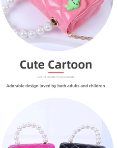 Detail of mini jelly handbag featuring faux pearl handle and cartoon rabbit accent
