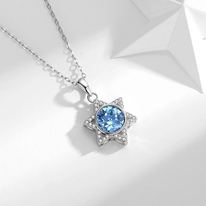 S925 sterling silver star necklace featuring a blue ocean heart pendant with white crystals