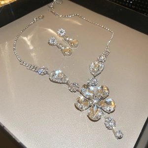 Exquisite silver-tone jewelry set with water drop flower pendants and sparkling crystals