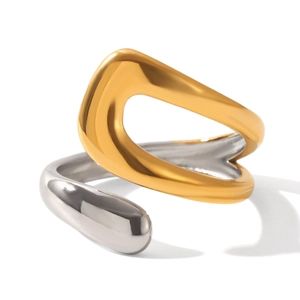 Macro shot of two-tone gold and silver minimalist open ring with geometric design