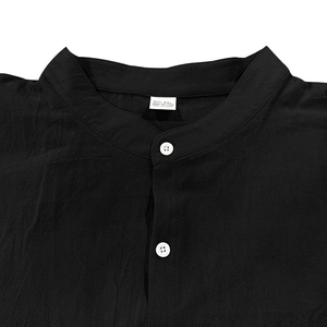 Detail of mandarin collar and XXL label on black 100% cotton casual shirt