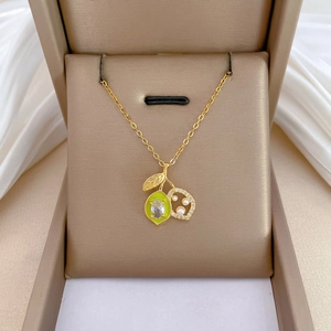 Elegant gold plated lemon fruit pendant necklace with green enamel and white pearls