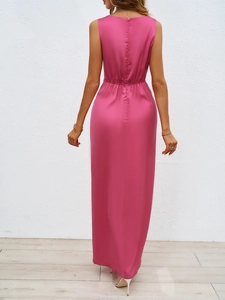 Back view of magenta sleeveless maxi dress featuring a high waist and silky satin fabric