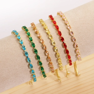 Macro detail of six marquise-cut colorful zircon tennis bracelets with adjustable chains