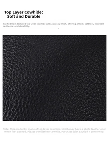 Close-up of black genuine cowhide leather with a premium lychee texture and soft finish
