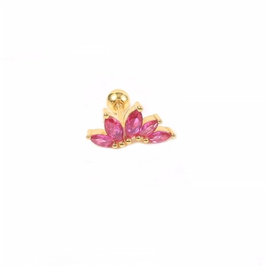 Macro detail of gold S925 silver stud earring with pink gemstones and screw back closure