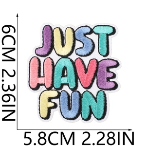 Detail view of colorful JUST HAVE FUN embroidered patch with exact dimensions