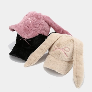 Plush baseball cap with rabbit ears and bow embroidery in pink, black, and beige colors