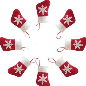Set of 8 red Christmas mini stockings with white snowflakes for cutlery decoration