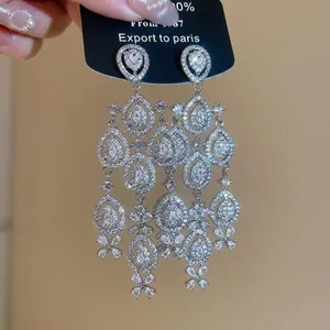 Elegant silver tassel earrings with teardrop zircons and cascading floral chandelier drop