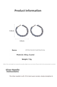 Detail view of geometric hoop earrings with blue stones measuring 4.9cm and weighing 7.3g