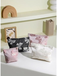 Pochette trucchi vintage con fiocco jacquard in varie dimensioni e colori eleganti