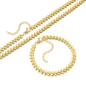Golden V-shaped link necklace and bracelet set in stainless steel with lobster clasp