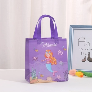 Purple non-woven mermaid gift bag with reinforced handles for birthday party favors