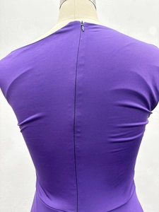 Detail view of the purple off-shoulder dress back with hidden zipper and slim-fit cut
