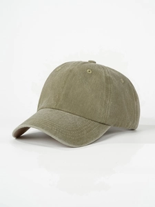 Detailed close-up of khaki washed cotton baseball cap texture and reinforced stitching